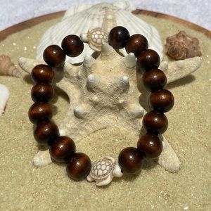 Beaded bracelet - wood and cream colored turquoise turtle beads